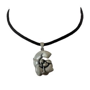 Silver tone cartoon dog on C pendant necklace on cord